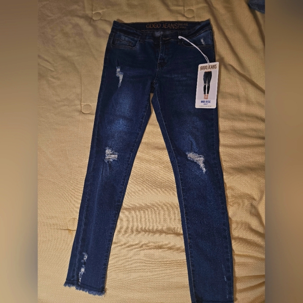 Women's Distressed Blue Jeans